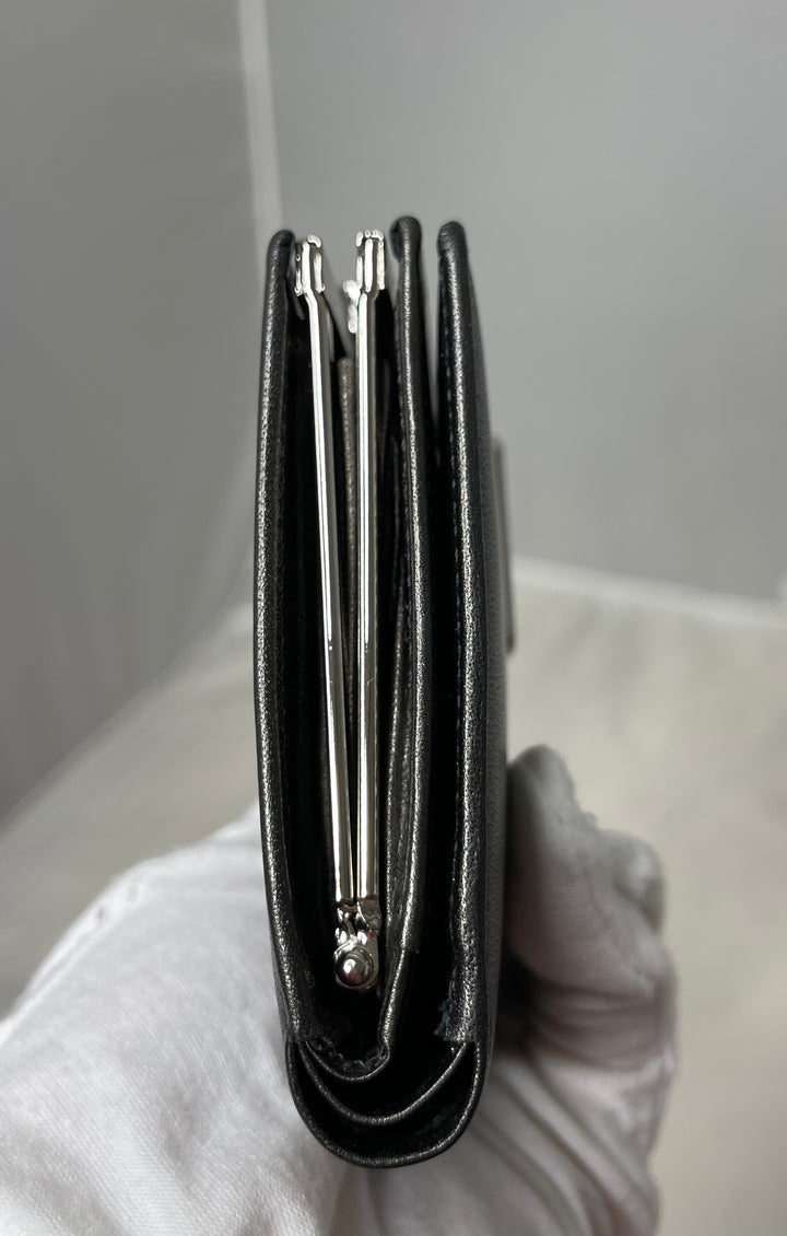Yves Saint Laurent (YSL) preloved gunmetal gray small compact french kiss lock wallet