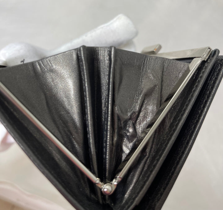 Yves Saint Laurent (YSL) preloved gunmetal gray small compact french kiss lock wallet