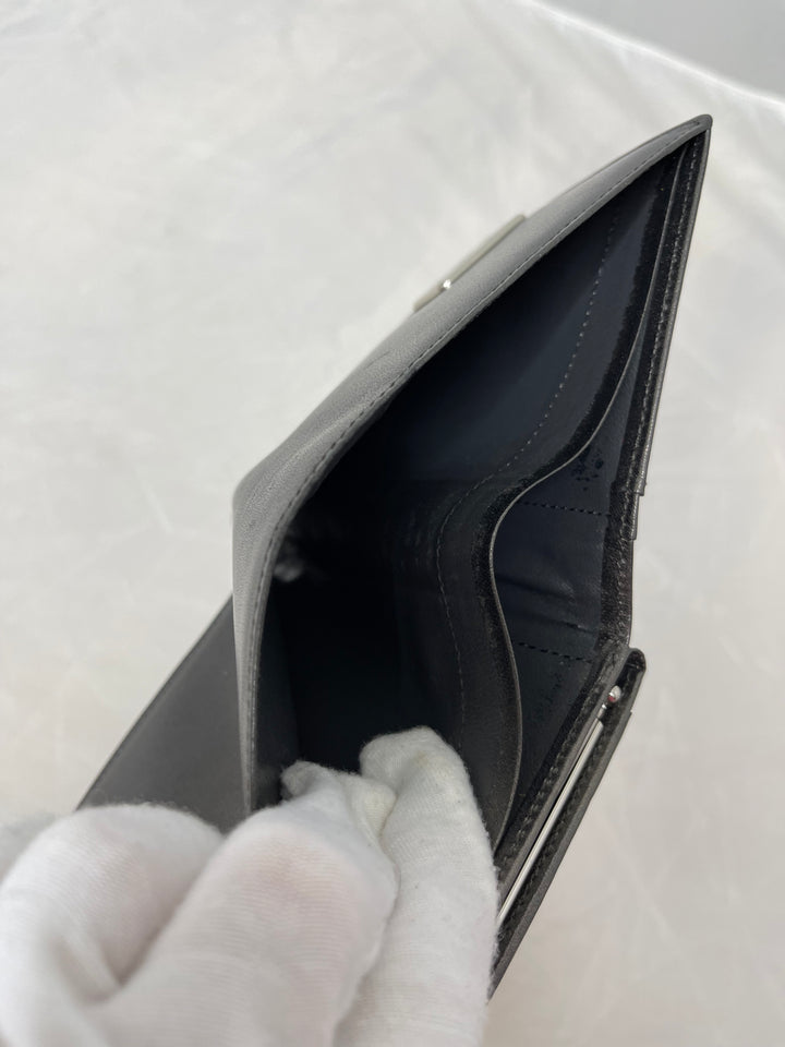Yves Saint Laurent (YSL) preloved gunmetal gray small compact french kiss lock wallet